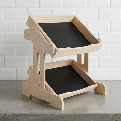 wooden display stand multi position on a cafe countertop 